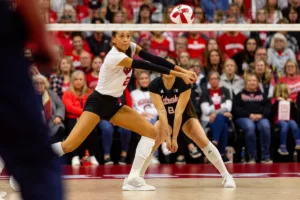 Nebraska Cornhusker Harper Murray (27) digs the ball against the Michigan Wolverines in the first set during the volleyball match on Friday, November 17, 2023, in Lincoln, Nebraska. Photo by John S. Peterson.