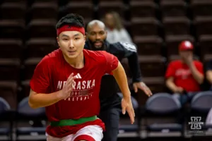 Nebraska Cornhusker guard Keisei Tominaga (30) warms up before the basketball game against the Oregon State Beavers on Saturday, November 18, 2023, in Sioux Falls, South Dakota. Photo by John S. Peterson.