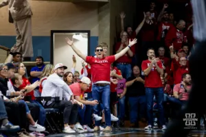 Nebraska Cornhusker fan celebrates a play against the Oregon State Beavers in the first half during the basketball game on Saturday, November 18, 2023, in Sioux Falls, South Dakota. Photo by John S. Peterson.
