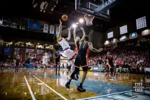 Nebraska Cornhusker guard Jamarques Lawrence (10) is fouled going for a layup against the Oregon State Beavers in the first half during the basketball game on Saturday, November 18, 2023, in Sioux Falls, South Dakota. Photo by John S. Peterson.