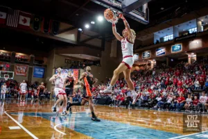Nebraska Cornhusker forward Josiah Allick (53) makes a dunk against Oregon State Beaver guard Dexter Akanno (4) in the second half during the basketball game on Saturday, November 18, 2023, in Sioux Falls, South Dakota. Photo by John S. Peterson.