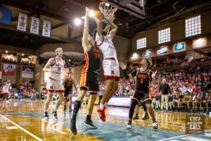 Nebraska Cornhusker guard Brice Williams (3) makes a layup against Oregon State Beaver forward Tyler Bilodeau (34) in the first half during the basketball game on Saturday, November 18, 2023, in Sioux Falls, South Dakota. Photo by John S. Peterson.