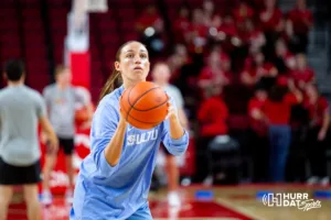 Creighton Bluejay forward Emma Ronsiek (31) takes a shot warming up for the Nebraska Cornhuskers during the basketball game on Sunday, November 19, 2023, in Lincoln, Nebraska. Photo by John S. Peterson.