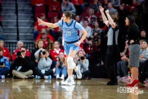 Creighton Bluejay guard Lauren Jensen (15) celebrates a three pointer in the first quarter in  against the Nebraska Cornhuskers during the basketball game on Sunday, November 19, 2023, in Lincoln, Nebraska. Photo by John S. Peterson.