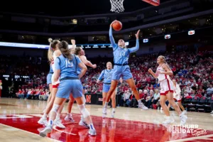 Creighton Bluejay forward Mallory Brake (14) grabs the rebound against the Nebraska Cornhuskers in the second quarter during the basketball game on Sunday, November 19, 2023, in Lincoln, Nebraska. Photo by John S. Peterson.