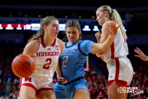 Nebraska Cornhusker guard Logan Nissley (2) drives to the basket against Creighton Bluejay guard Kennedy Townsend (2) in the third quarter during the basketball game on Sunday, November 19, 2023, in Lincoln, Nebraska. Photo by John S. Peterson.