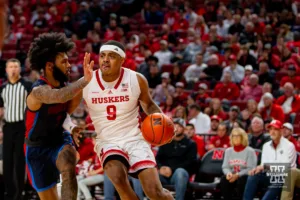 Nebraska Cornhusker guard Jarron Coleman (9) drives to the lane against Duquesne Duke guard Dae Dae Grant (3) in the second half during the college basketball game on Wednesday November 22, 2023, in Lincoln, Neb. Photo by John S. Peterson.