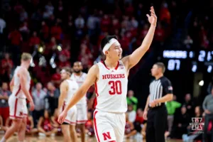 Nebraska Cornhusker guard Keisei Tominaga (30) waves to the fans to make some noise against the Duquesne Dukes in the second half during the college basketball game on Wednesday November 22, 2023, in Lincoln, Neb. Photo by John S. Peterson.