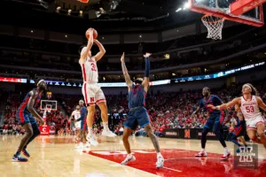 Nebraska Cornhusker guard Keisei Tominaga (30) makes a jump shot against Duquesne Duke guard Dae Dae Grant (3) in the second half during the college basketball game on Wednesday November 22, 2023, in Lincoln, Neb. Photo by John S. Peterson.