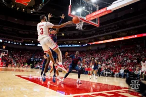 Nebraska Cornhusker guard Brice Williams (3) makes a pass to forward Juwan Gary (4) against Duquesne Duke forward Halil Barre (5) in the second half during the college basketball game on Wednesday November 22, 2023, in Lincoln, Neb. Photo by John S. Peterson.