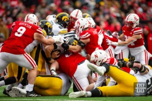 Nebraska Cornhuskers stop the Iowa Hawkeyes on a short yardage play in the fourth quarter during the football game on Thursday, November 24, 2023, in Lincoln, Neb. Photo by John S. Peterson.