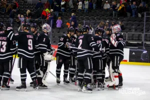Omaha Mavericks celebrate the win over the Augustana Vikings during the hockey match on Saturday, November 25, 2023, in Sioux Falls, SD. Photo by John S. Peterson.