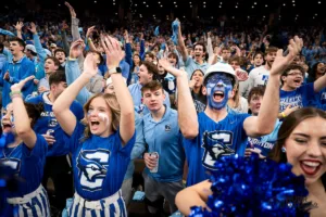 Creighton Bluejays fans cheer during a game against against the Alabama Crimson Tide at CHI Arena in Omaha, NE December 16th 2023. Photo by Eric Francis