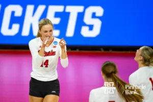 Nebraska Cornhusker Ally Batenhorst (14) celebrates a point against the Long Island Sharks during the first round of the NCAA volleyball championships on Friday, December 1, 2023, in Lincoln, Neb. Photo by John S. Peterson.