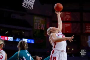 Nebraska Cornhusker center Alexis Markowski (40) reaches for the rebound against UNC Wilmington Seahawks in the first half during a college basketball game Tuesday, December 5, 2023, in Lincoln, Neb. Photo by John S. Peterson.