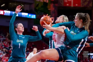 Nebraska Cornhusker center Alexis Markowski is fouled goign for a lay up against the UNC Wilmington Seahawks in the first half during a college basketball game Tuesday, December 5, 2023, in Lincoln, Neb. Photo by John S. Peterson.