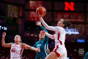 Nebraska Cornhusker guard Darian White (0) makes a lay up agianst the UNC Wilmington Seahawks in the first quarter during a college basketball game Tuesday, December 5, 2023, in Lincoln, Neb. Photo by John S. Peterson.