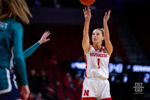 Nebraska Cornhusker guard Jaz Shelley (1) makes a three against the UNC Wilmington Seahawks in the first half during a college basketball game Tuesday, December 5, 2023, in Lincoln, Neb. Photo by John S. Peterson.
