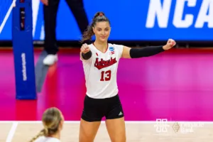 Nebraska Cornhusker Merritt Beason (13) celebrates a point against the Georgia Tech Yellow Jackets in the second set during the third round in the NCAA Volleyball Championship match Thursday, December 7, 2023, Lincoln, Neb. Photo by John S. Peterson.