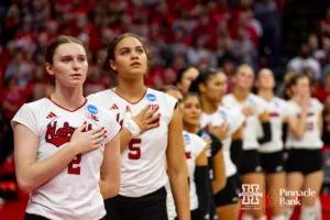 Nebraska Cornhuskers line up for the National Anthem before taking on the Arkansas Razorbacks during the Regional Championship match in the NCAA Volleyball Championship Thursday, December 7, 2023, Lincoln, Neb. Photo by John S. Peterson.