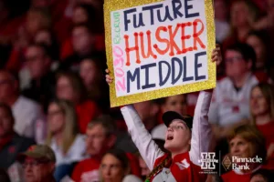 Nebraska Cornhusker fan holding a sign during the Regional Championship match against the Arkansas Razorbacks in the NCAA Volleyball Championship Thursday, December 7, 2023, Lincoln, Neb. Photo by John S. Peterson.