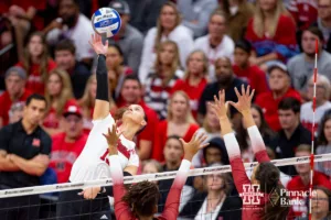 Nebraska Cornhusker Merritt Beason (13) spikes the ball against the Arkansas Razorbacks in the first set during the third round in the NCAA Volleyball Championship match on Saturday, December 9, 2023, Lincoln, Neb. Photo by John S. Peterson.