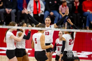 Nebraska Cornhuskers celebrates a point against the Arkansas Razorbacks during the third round in the NCAA Volleyball Championship match on Saturday, December 9, 2023, Lincoln, Neb. Photo by John S. Peterson.