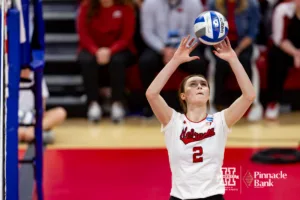 Nebraska Cornhusker Bergen Reilly (2) sets the ball against the Arkansas Razorbacks in the third set during the Regional Championship match in the NCAA Volleyball Championship Thursday, December 7, 2023, Lincoln, Neb. Photo by John S. Peterson.