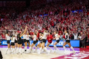 Nebraska Cornhuskers win match point against   the Arkansas Razorbacks in four sets during the Regional Championship match in the NCAA Volleyball Championship Thursday, December 7, 2023, Lincoln, Neb. Photo by John S. Peterson.