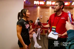 Nebraska Cornhusker Lexi Rodriguez (8) interviewed by Jacob Papilla of Hurrdat Sports after the win over the Arkansas Razorbacks during the Regional Championship match in the NCAA Volleyball Championship Thursday, December 7, 2023, Lincoln, Neb. Photo by John S. Peterson.