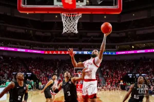 Nebraska Cornhusker guard Brice Williams (3) makes a layup against the Michigan State Spartans in the second half during the college basketball game Sunday, December 10, 2023, Lincoln, Neb. Photo by John S. Peterson.