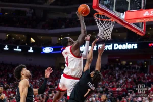 Nebraska Cornhusker forward Juwan Gary (4) makes a layup against Michigan State Spartan guard Jeremy Fears Jr. (1) in the second half during the college basketball game Sunday, December 10, 2023, Lincoln, Neb. Photo by John S. Peterson.