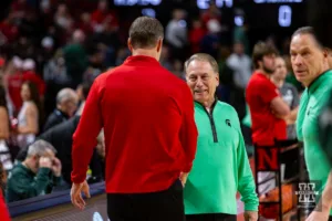 Nebraska Cornhusker head coach Fred Hoiberg and Michigan State Spartan head coach Tom Izzo shake hands before the college basketball game Sunday, December 10, 2023, Lincoln, Neb. Photo by John S. Peterson.