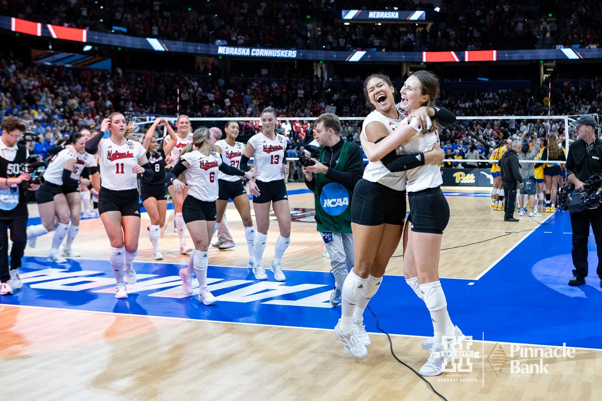 Nebraska Cornhusker setter Kennedi Orr (9) and Nebraska Cornhusker setter Bergen Reilly (2) celebrate the win over the Pittsburgh Panthers in three sets during the NCAA Semi-Finals, Thursday, December 14, 2023, Tampa, Florida. Photo by John S. Peterson.