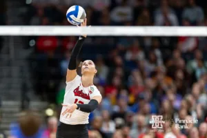 Nebraska Cornhusker outside hitter Merritt Beason (13) serves the ball against the Pittsburgh Panthers in the first set during the NCAA Semi-Finals, Thursday, December 14, 2023, Tampa, Florida. Photo by John S. Peterson.