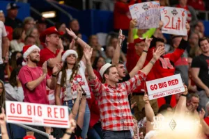 Nebraska Cornhuskers fans celebrate a point against the Pittsburgh Panthers in the first set during the NCAA Semi-Finals, Thursday, December 14, 2023, Tampa, Florida. Photo by John S. Peterson.