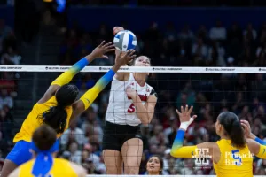 Nebraska Cornhusker middle blocker Bekka Allick (5) spikes the ball against the Pittsburgh Panthers in the third set during the NCAA Semi-Finals, Thursday, December 14, 2023, Tampa, Florida. Photo by John S. Peterson.