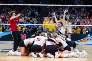 Nebraska Cornhuskers celebrate the win over the Pittsburgh Panthers in three sets during the NCAA Semi-Finals, Thursday, December 14, 2023, Tampa, Florida. Photo by John S. Peterson.