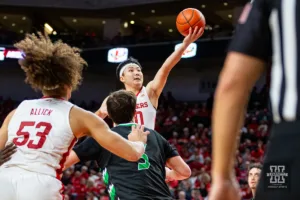 Nebraska Cornhusker guard Keisei Tominaga (30) makes a layup against the North Dakota Fighting Hawks in the second half during a college basketball game Wednesday, December 20, 2023, in Lincoln, Nebraska. Photo by John S. Peterson.