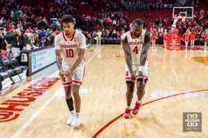 Nebraska Cornhusker guard Jamarques Lawrence (10) and forward Juwan Gary (4) do a little dance after the win over the North Dakota Fighting Hawks during a college basketball game Wednesday, December 20, 2023, in Lincoln, Nebraska. Photo by John S. Peterson.