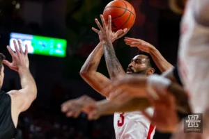 Nebraska Cornhusker guard Brice Williams (3) puts up a shot against the North Dakota Fighting Hawks in the first half during a college basketball game Wednesday, December 20, 2023, in Lincoln, Nebraska. Photo by John S. Peterson.