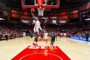 Nebraska Cornhusker forward Juwan Gary (4) makes a dunk against the South Carolina State Bulldogs in the first half during a college basketball game on Friday, December 29, 2023, in Lincoln, Nebraska. Photo by John S. Peterson.