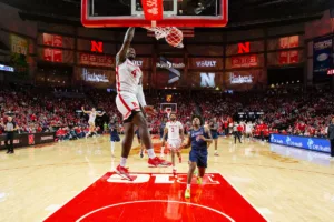 Nebraska Cornhusker forward Juwan Gary (4) makes a dunk against the South Carolina State Bulldogs in the first half during a college basketball game on Friday, December 29, 2023, in Lincoln, Nebraska. Photo by John S. Peterson.