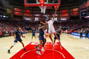 Nebraska Cornhusker guard Brice Williams (3) makes a layup against South Carolina State Bulldog center Dallas James (42) in the first half during a college basketball game on Friday, December 29, 2023, in Lincoln, Nebraska. Photo by John S. Peterson.