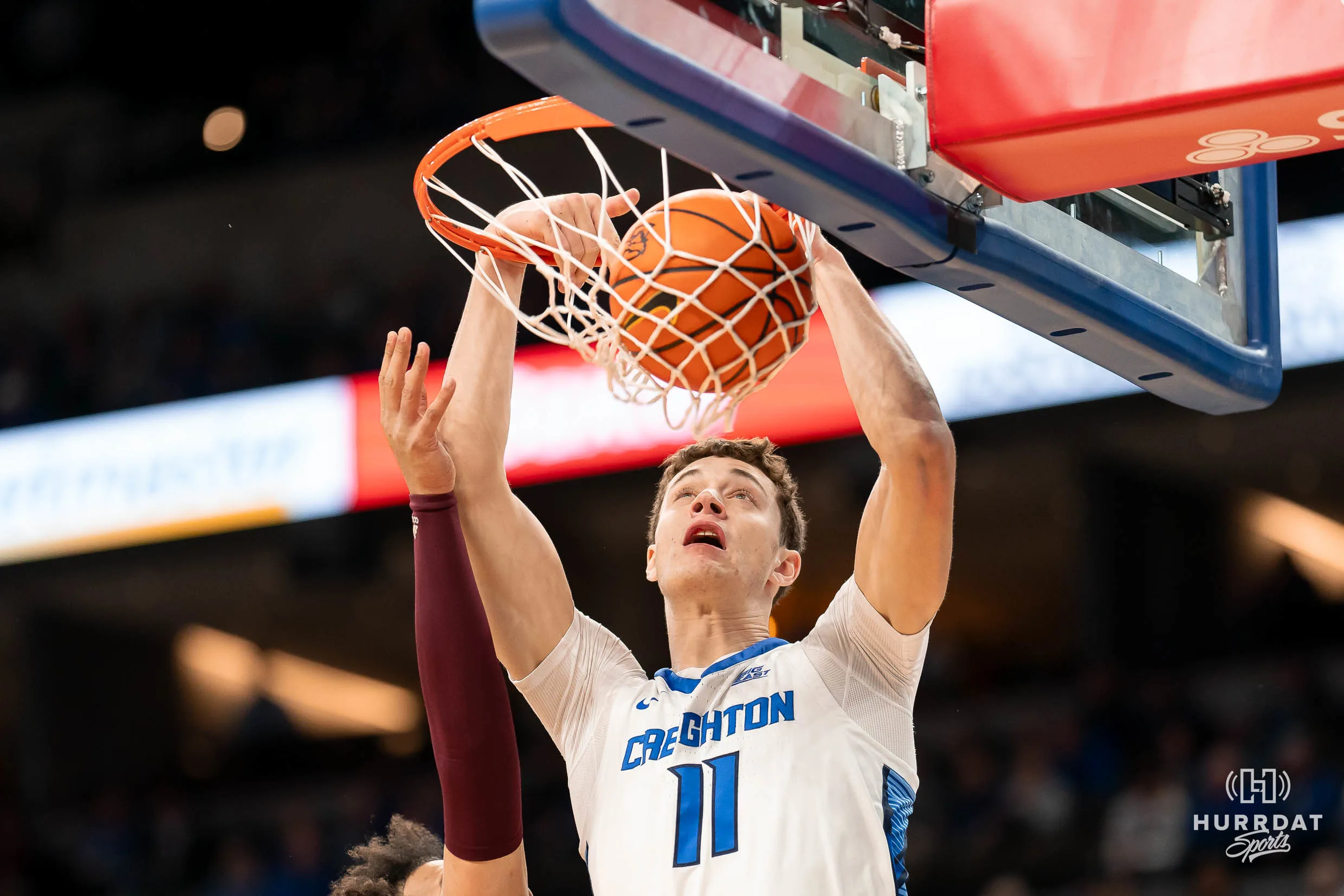 Creighton Bluejays center Ryan Kalkbrenner #11 slams the ball home during a game against against the Central Michigan Chippewas at CHI Arenain Omaha, NE December 9th 2023. Photo by Eric Francis