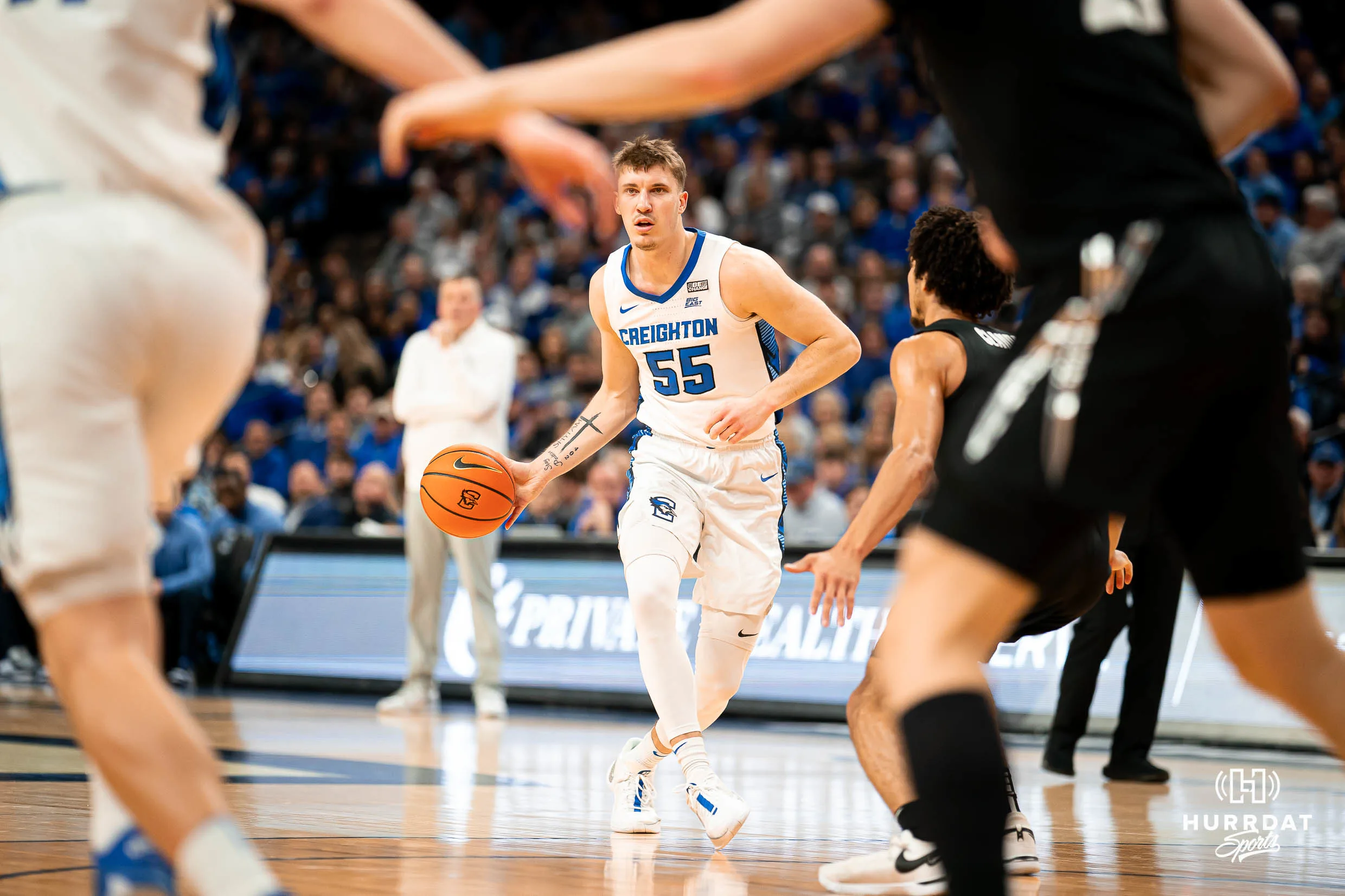 Creighton Bluejays guard Baylor Scheierman #55 looks for an opening against the Xavier Musketeers during a game at CHI Health Center in Omaha, NE January 23rd 2024. Photo by Eric Francis