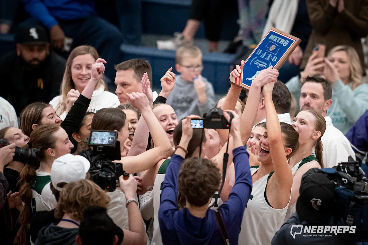 Millard West High School celebrate after winning the Metro Holiday Basketball Tournament in Omaha, NE January 3rd 2024. Photo by Eric Francis