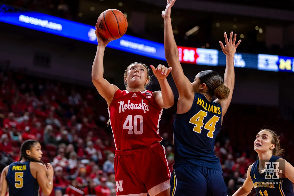 Nebraska Cornhusker center Alexis Markowski (40) puts up a lay up against Michigan Wolverine forward Cameron Williams (44) in the first half during a college basketball game on Wednesday, January 17, 2024, in Lincoln, Nebraska. Photo by John S. Peterson.
