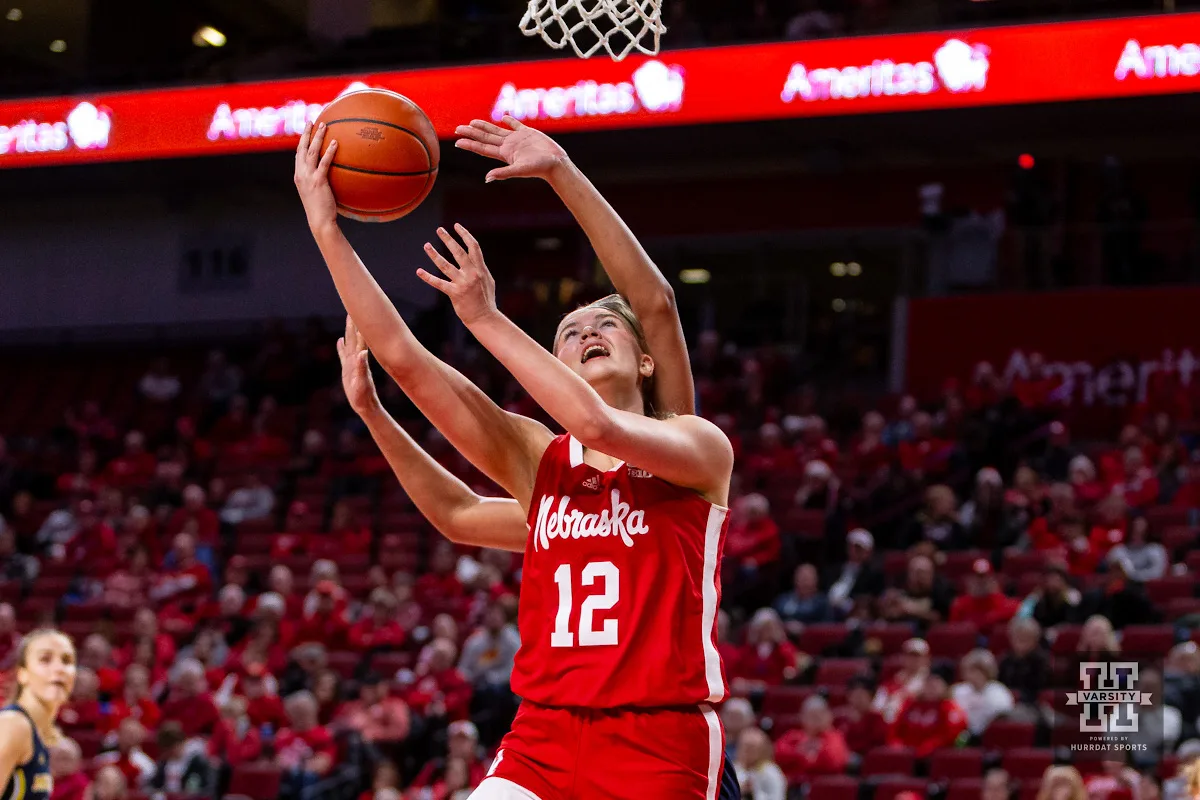 Nebraska Cornhusker forward Jessica Petrie (12) makes a basket against the Michigan Wolverines in the second half during a college basketball game on Wednesday, January 17, 2024, in Lincoln, Nebraska. Photo by John S. Peterson.