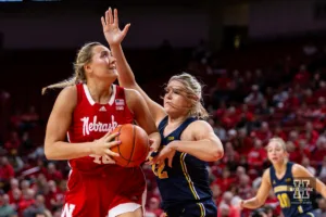 Nebraska Cornhusker center Alexis Markowski (40) makes a lay up against Michigan Wolverine forward Chyra Evans (22) in the second half during a college basketball game on Wednesday, January 17, 2024, in Lincoln, Nebraska. Photo by John S. Peterson.